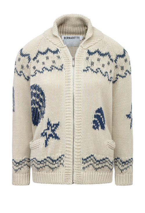 Knitted cardigan with blue patterns on a white background