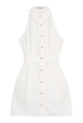 White button-front sleeveless dress with tie-around back and cutout detail. Set against a checkered background.
