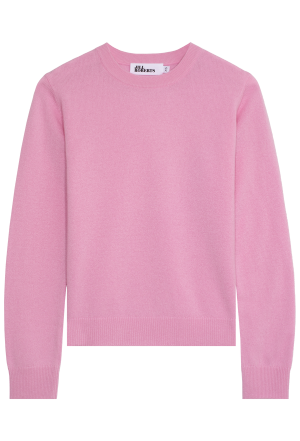 Pink sweater on a white background