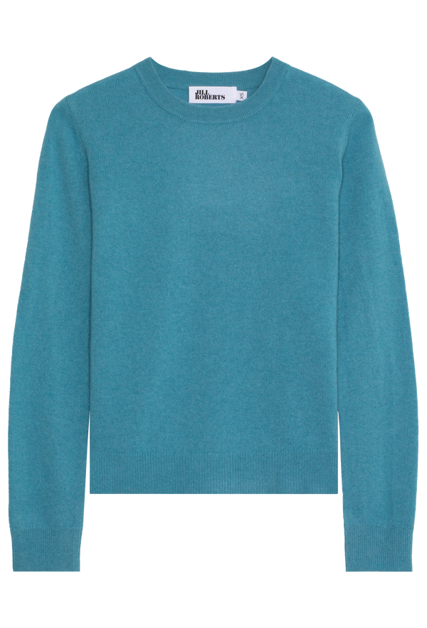 Teal sweater on a white background