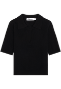 A black short-sleeve knit polo shirt with a collar and a partial button placket, shown flat against a white background. 