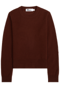 A dark rusty red crewneck knit sweatershown flat against a solid white background.