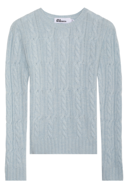 Light blue cable knit sweater on a white background
