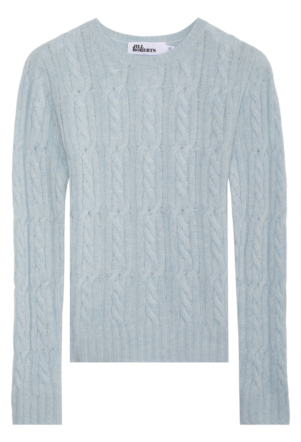 Light blue cable knit sweater on a white background