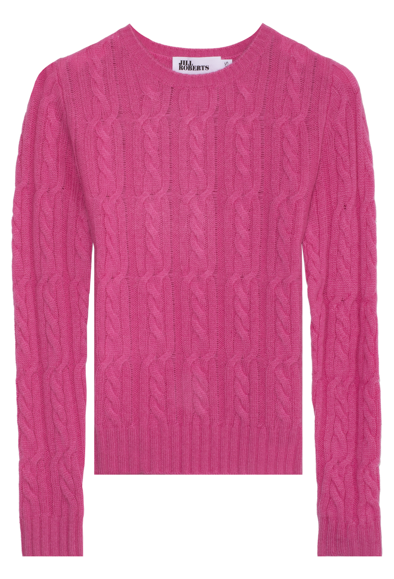 Pink cable knit sweater on a white background