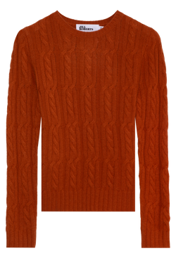 Orange cable knit sweater on a white background