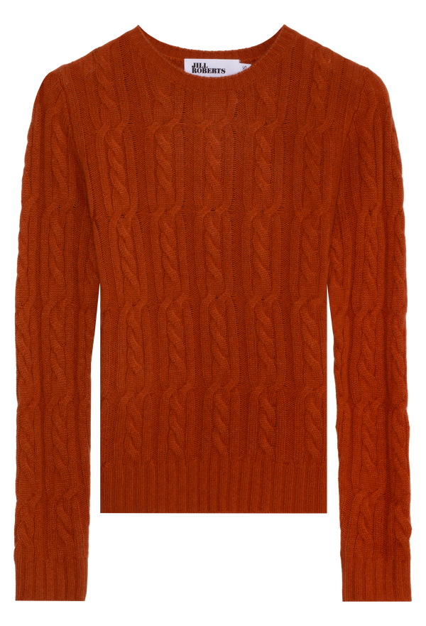Orange cable knit sweater on a white background