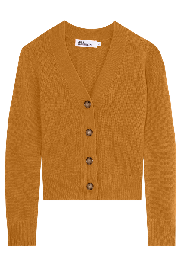 Gold cardigan with large button details on a transparent background