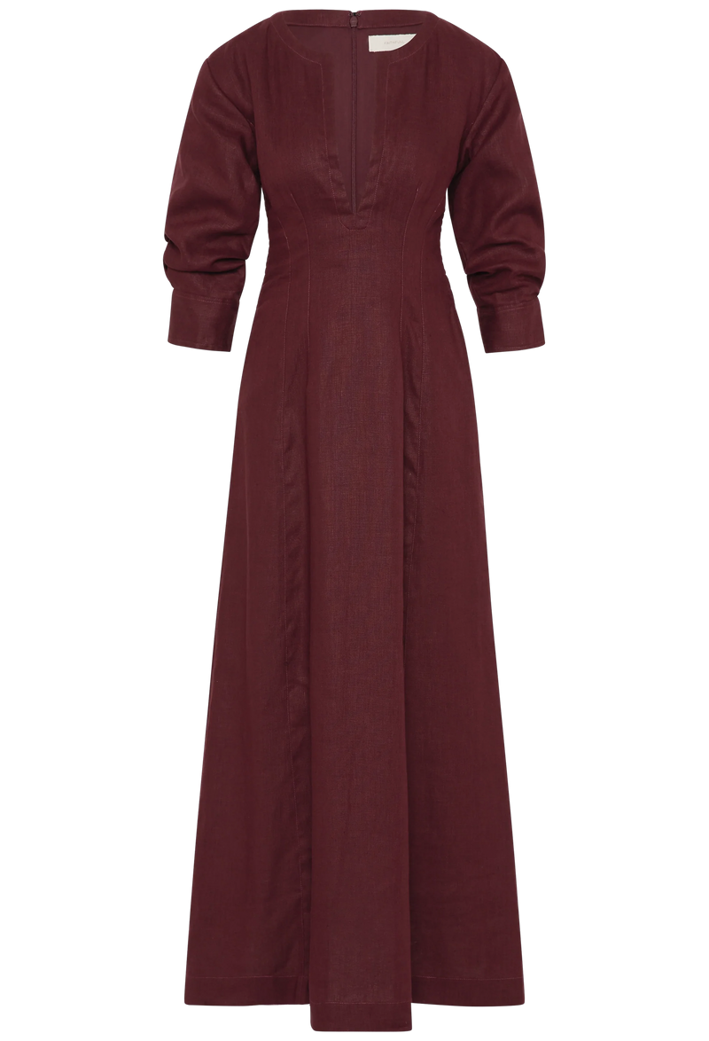a midi burgundy dress with 3/4 sleeves and a deep v-neck. white background.