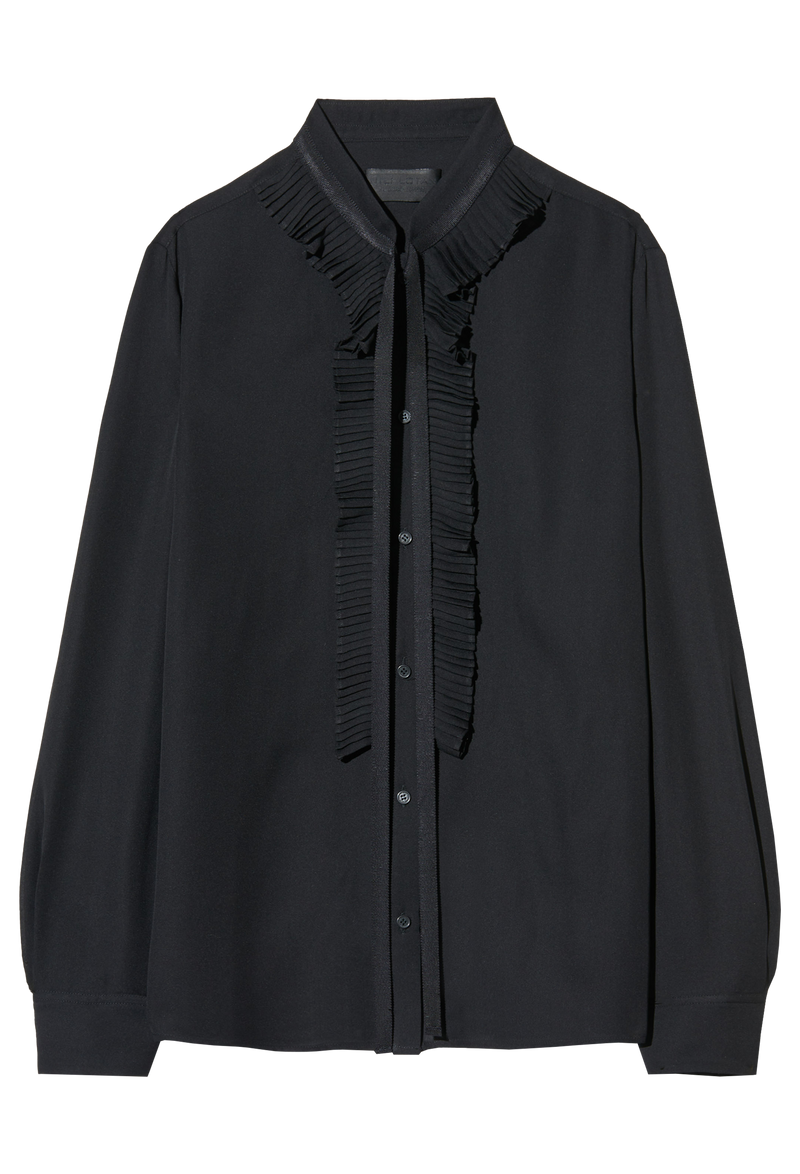 Black blouse with ruffled details on a white background