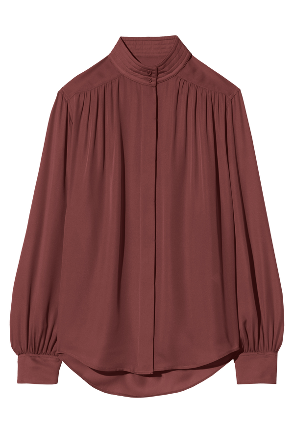 burgundy blouse with long sleeves and a high collar on a white background