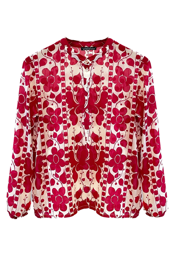 Red and white floral patterned blouse on a white background
