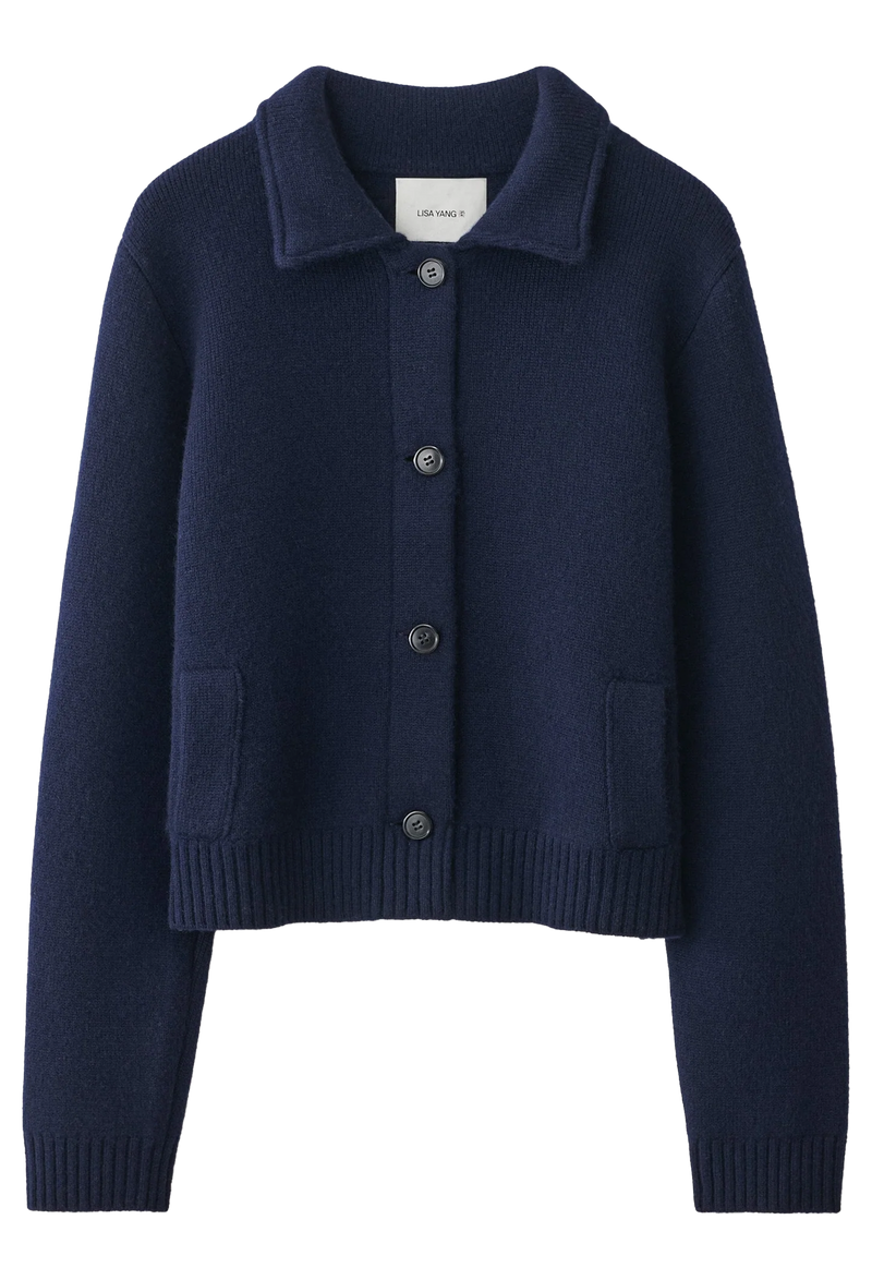 Navy blue cardigan with button details on a white background