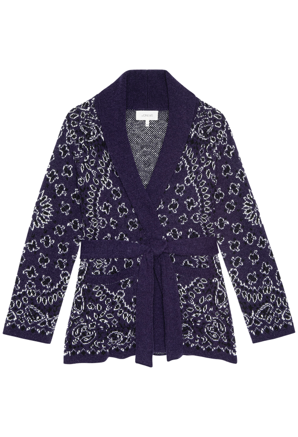 Navy cardigan with bandana pattern on a white background