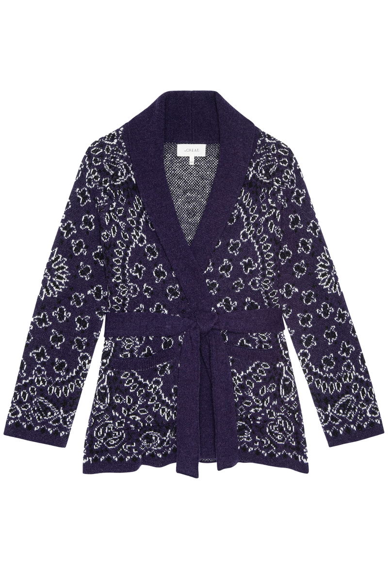 Navy cardigan with bandana pattern on a white background