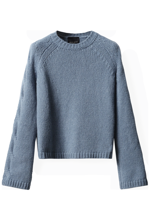 Blue knitted sweater on a white background