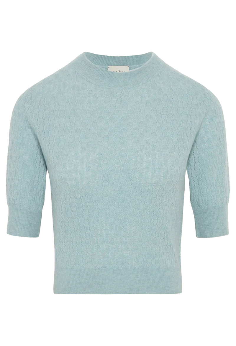 Light blue sweater with short sleeves on a white background
