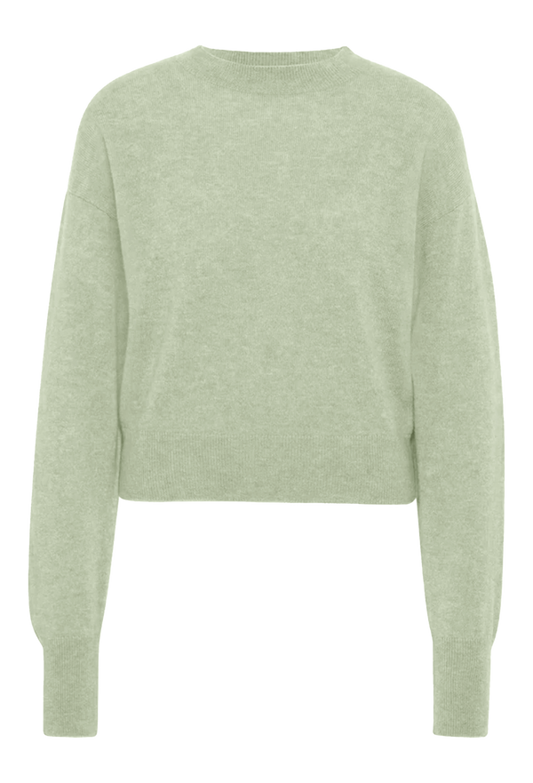 Light green sweater on a white background