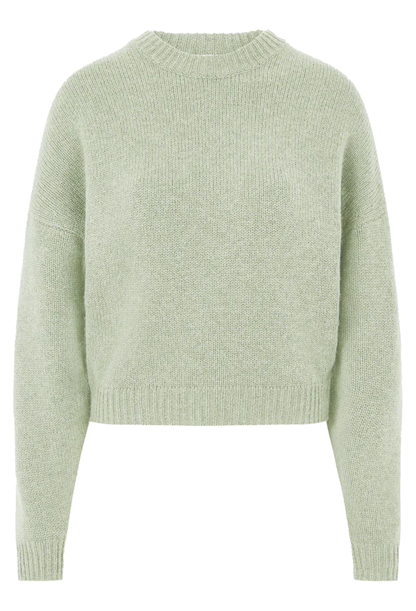 Light green knitted sweater on a white background