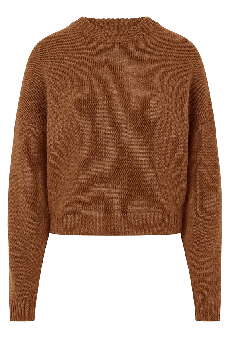 Brown knitted sweater on a white background
