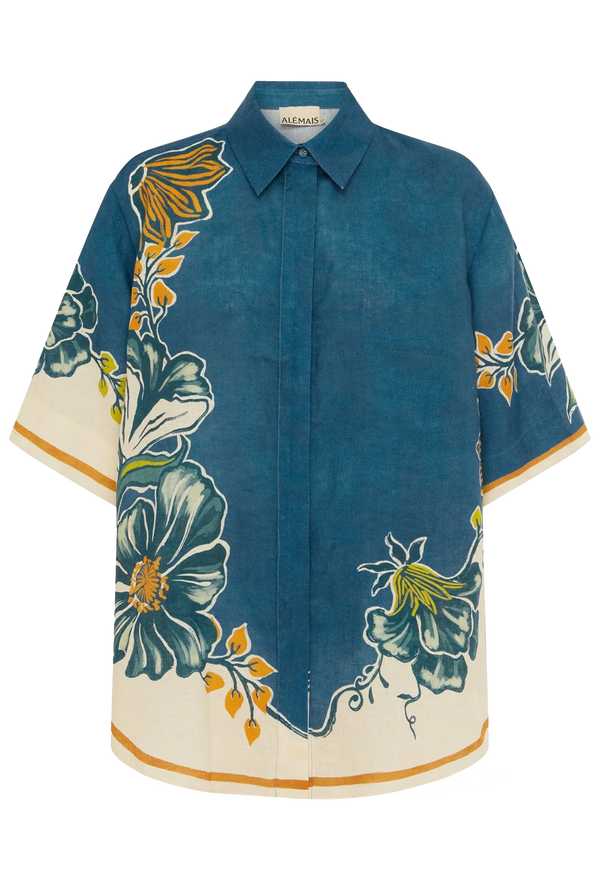 Blue shirt with floral patterns on a white background