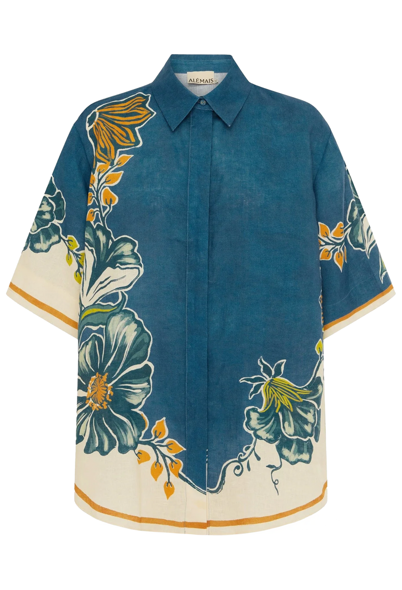 Blue shirt with floral patterns on a white background