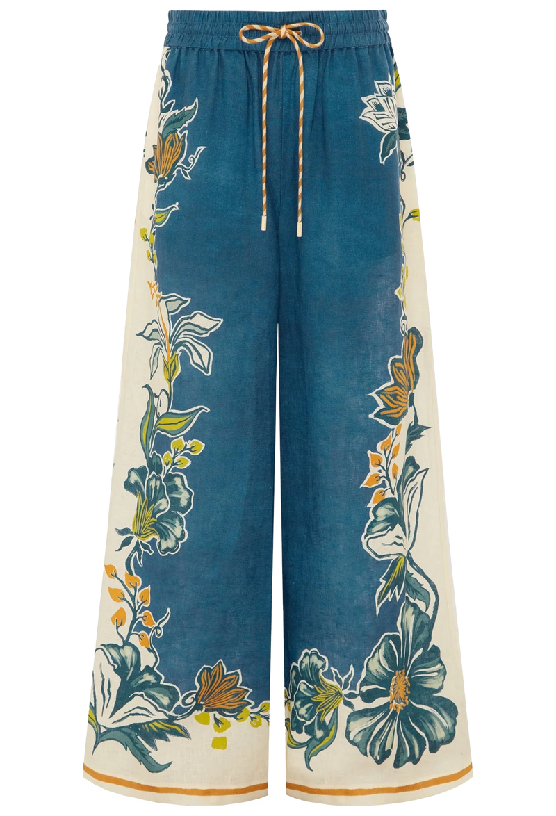 Floral-patterned pants with a blue and white color scheme on a white background