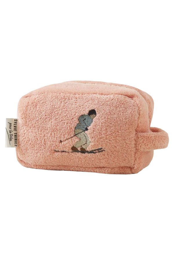 Pink pouch with embroidered design on a white background