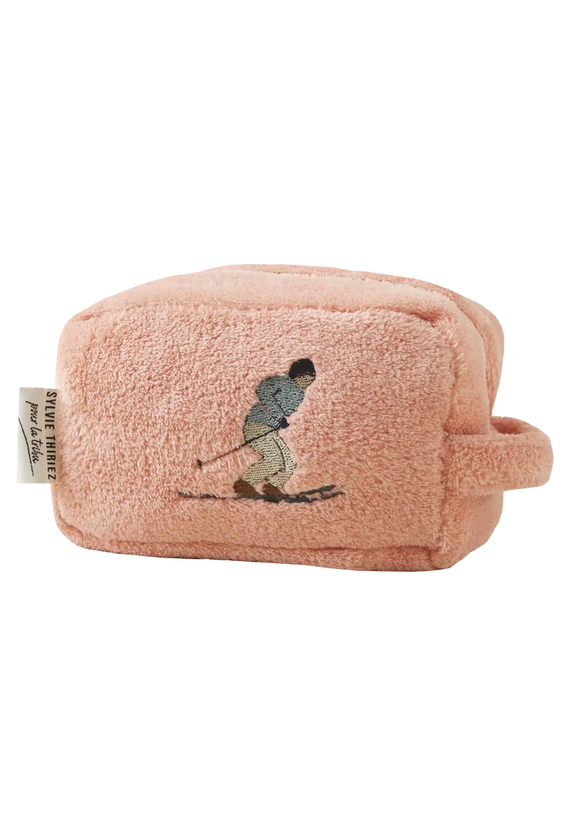 Pink pouch with embroidered design on a white background