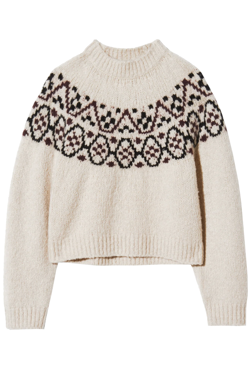 a beige fair isle sweater with a plain background