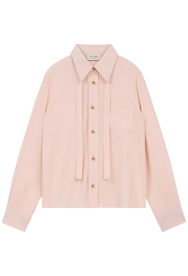 Pink shirt with gold buttons on a white background