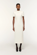 White dress worn by a model on a white background