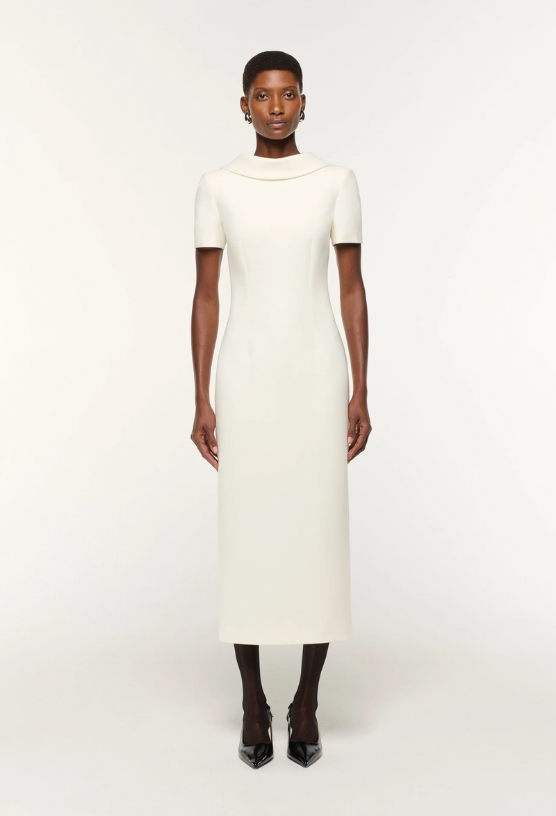 White dress worn by a model on a white background