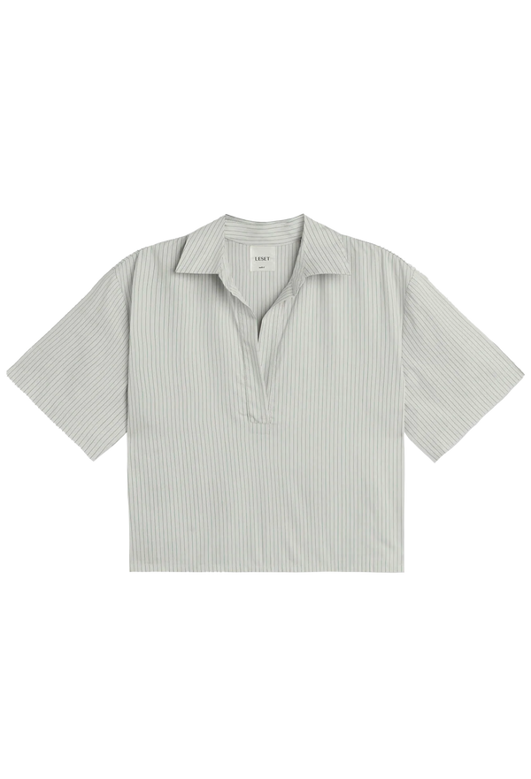 Short-sleeve shirt with a collar on a white background