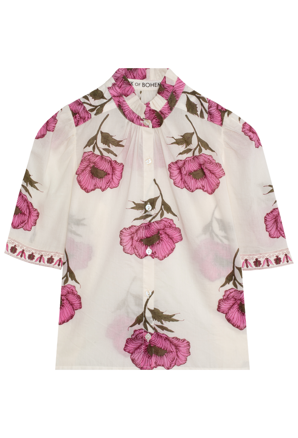 Floral patterned shirt with pink flowers on a white background