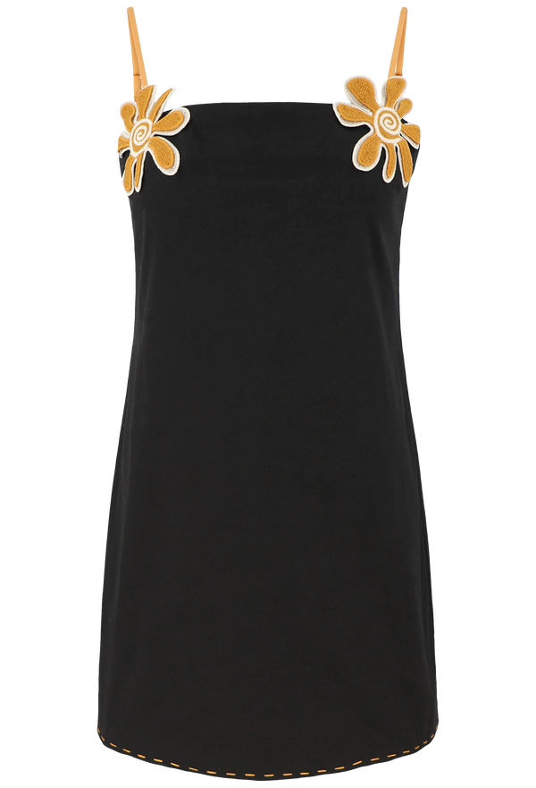 black dress with spaghetti straps and yellow floral detailing on a white background