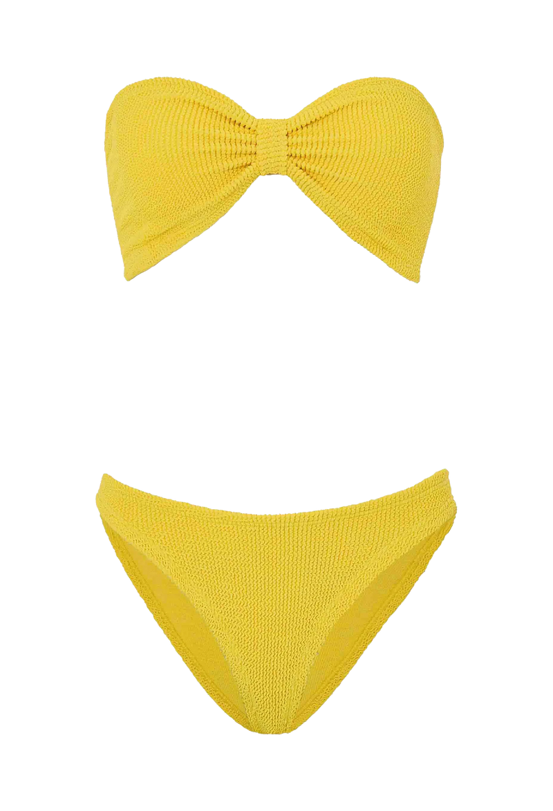 a woman wearing a yellow strapless bikini on a white background