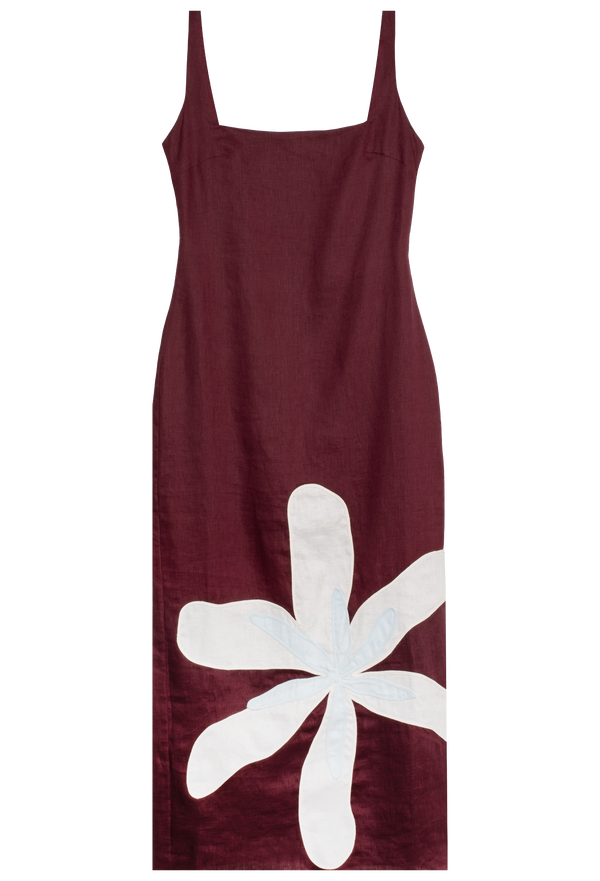 Maroon dress with a large white flower design on a white background