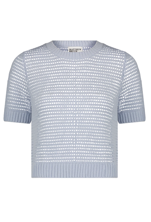 a light blue short sleeve knit top on a white background