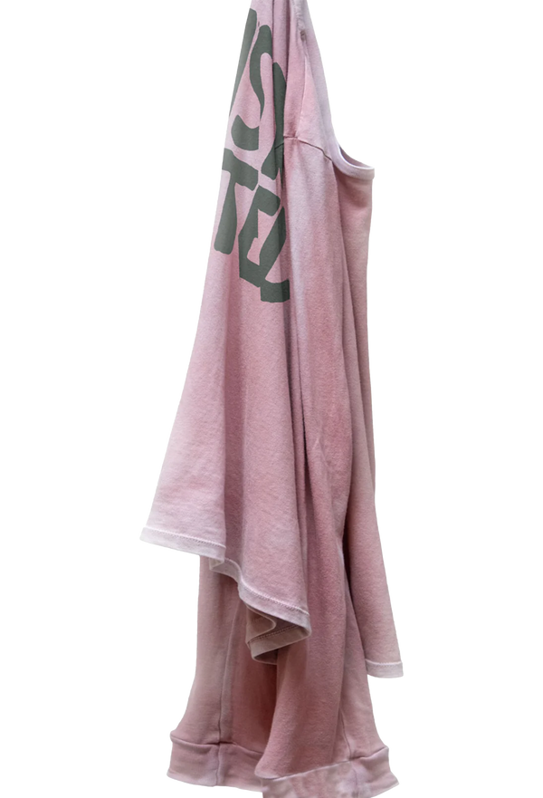 a pink long sleeve tee with ARTISTS WANTED on the back