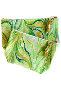 Green marbled pouch with a gold zipper on a white background