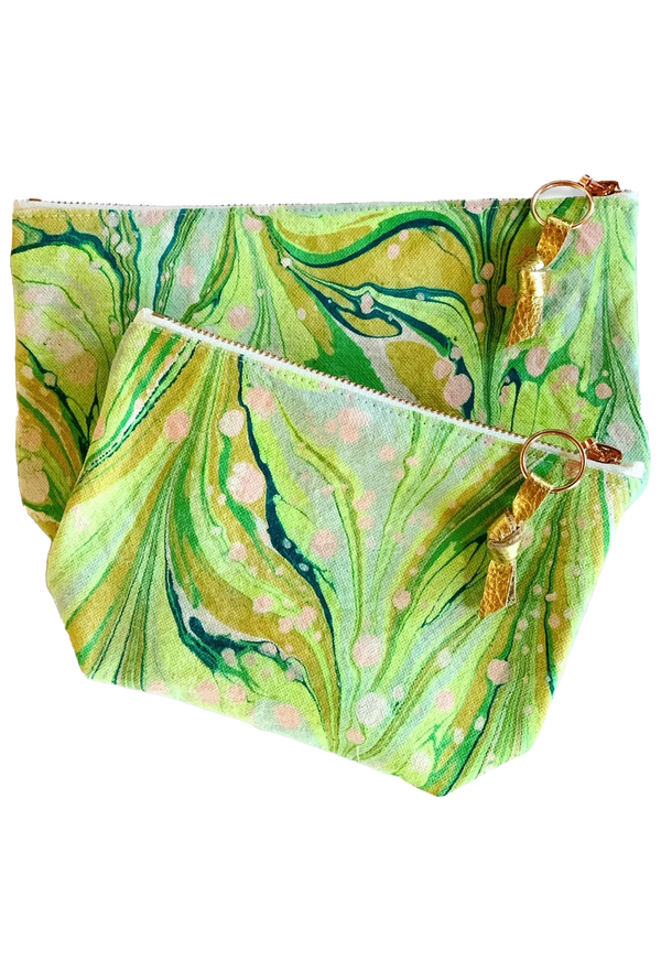 Green marbled pouch with a gold zipper on a white background