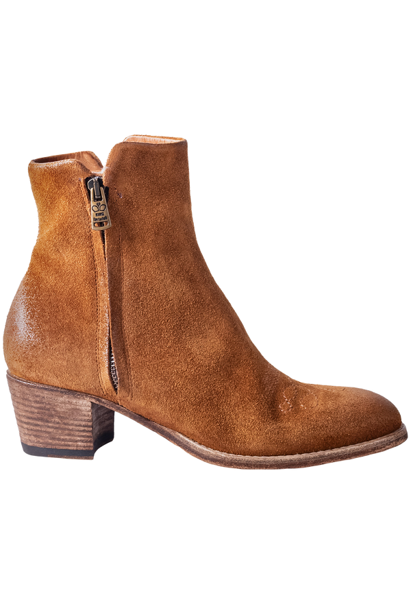 Brown suede ankle boot with a zipper on a white background