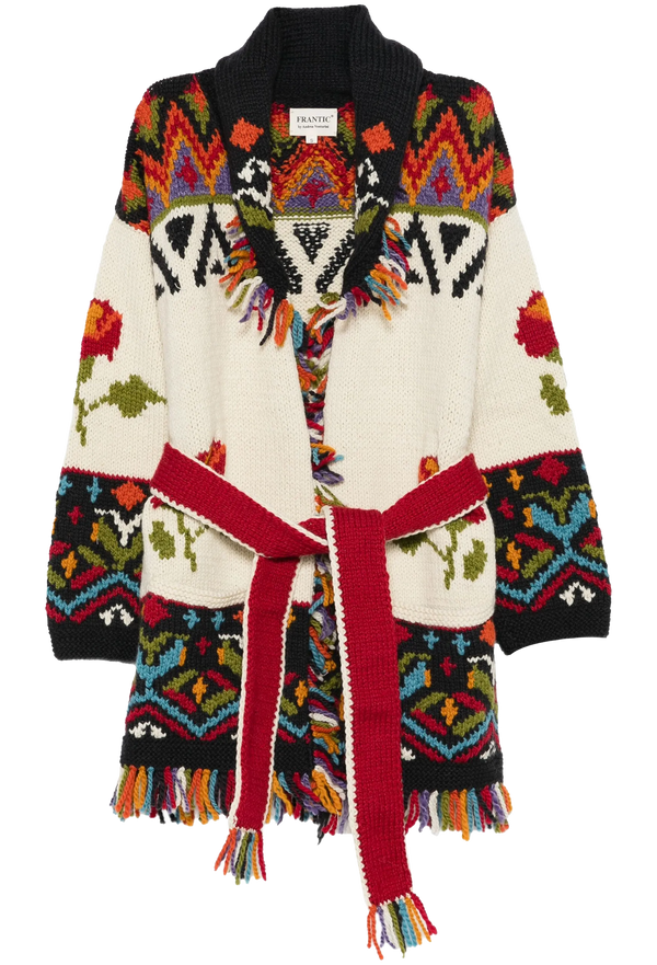 Colorful knitted cardigan with geometric patterns on a white background