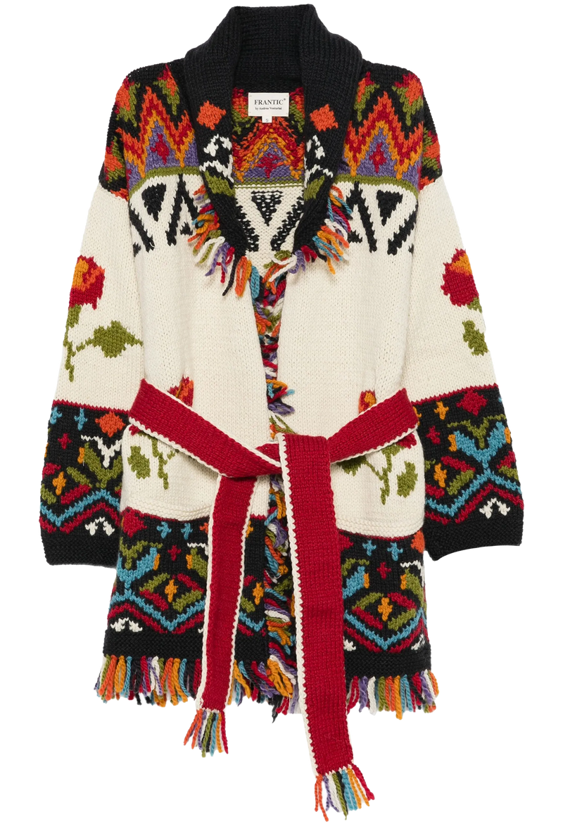 Colorful knitted cardigan with geometric patterns on a white background