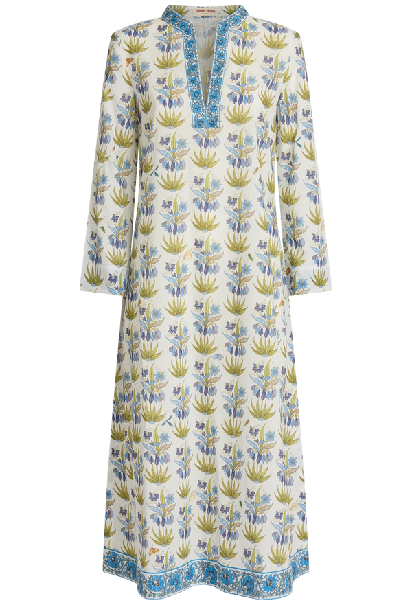 Long floral dress with a pattern of blue and green on a white background