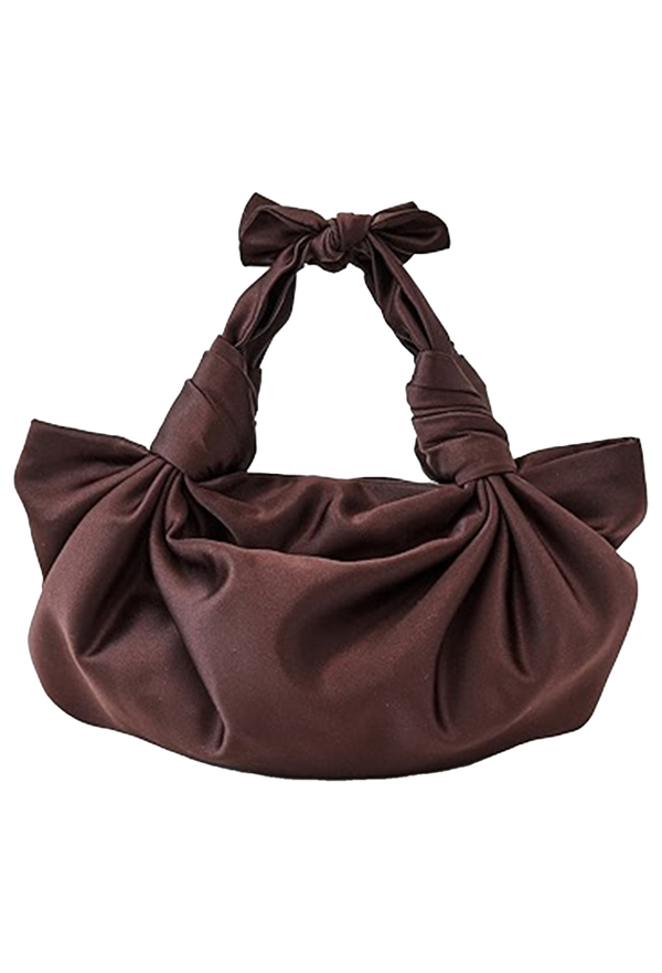 Brown handbag with a bow on a white background