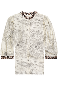 Long-sleeve top with a patterned design on a white background