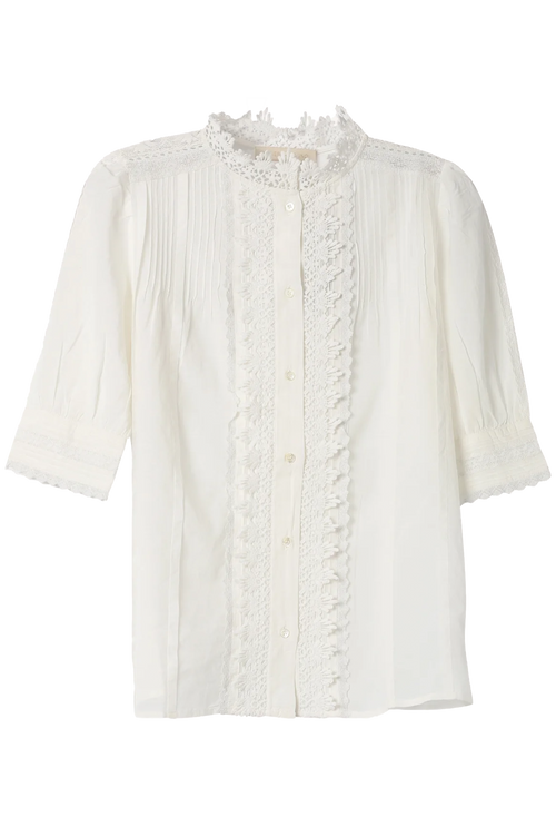 White blouse with ruffled details on a white background
