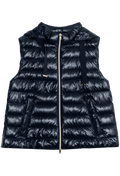 Black puffer vest on a white background